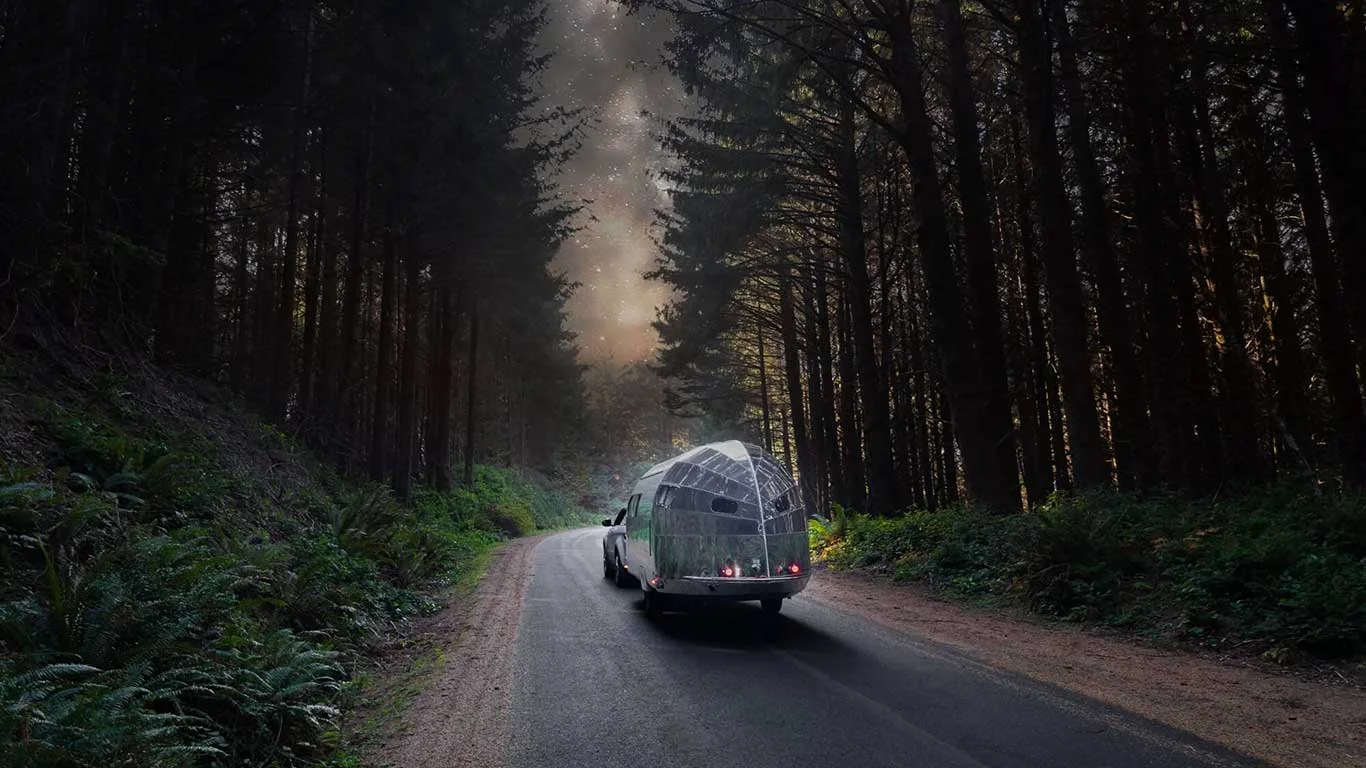 camper caravan on back of car.