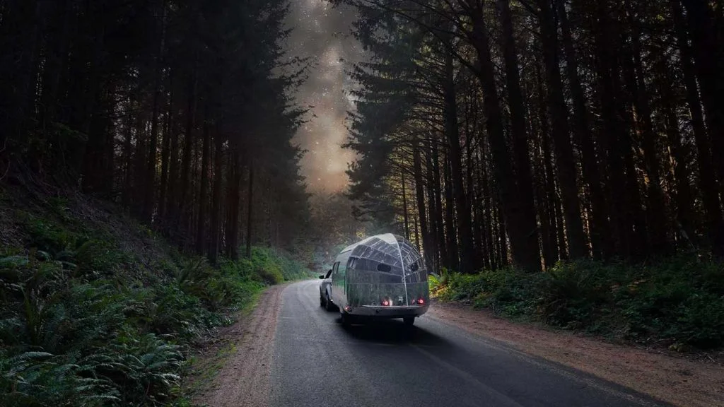 camper caravan on back of car.